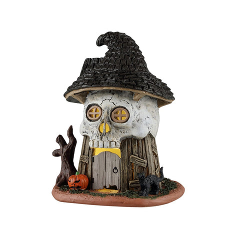 Lemax Spooky Town Witch's Skull Hut table accent with a haunted, eerie design for Halloween decorations.