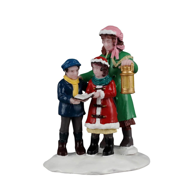 Lemax Christmas village figurine featuring carolers singing in front of a festive holiday scene.