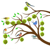 Wild Birds Fat Ball Garland by Creative Products hanging on a garden branch, designed for wild bird feeding and care.