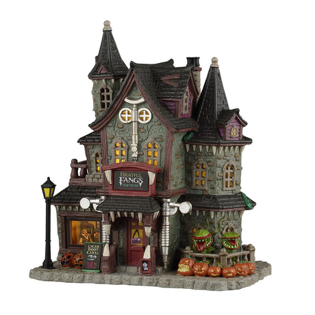 Lemax Spooky Town Frightful Fangs Dentistry lighted building with spooky dental office and eerie Halloween decorations.