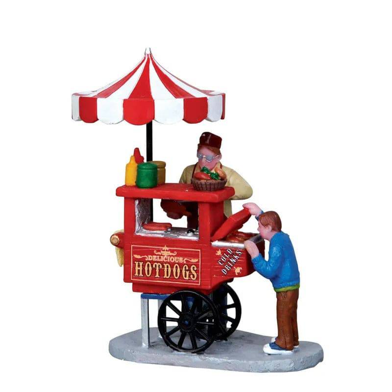 Lemax Christmas Village figurine of a hot dog cart, detailed holiday-themed Lemax figurine for festive village displays.