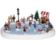 Lemax Sights & Sounds Christmas Village Skating Pond scene with festive holiday decorations and animated figures.