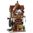 Lemax Coffee Bean Grinder illuminated building from Christmas village, featuring detailed design and LED lighting display.