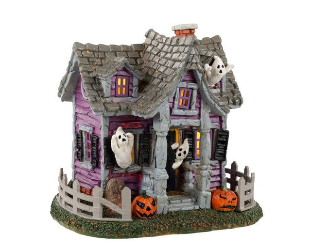 Lemax Spooky Town Ghost Cottage table accent with haunted house details and eerie lighting for Halloween display.