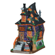 Lemax Spooky Town illuminated Witches Bungalow building with spooky Halloween decorations and glowing windows.
