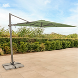 Kettler Luna 3x3M square cantilever parasol with meadow green canopy, granite base, and night cover for outdoor furniture.