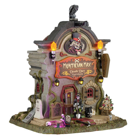 Lemax Spooky Town Mortician Max death day services illuminated building with 4.5V adaptor, featuring spooky mortician scene and lights.
