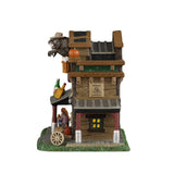 Silver Slug Saloon illuminated building from Lemax Spooky Town, featuring spooky town charm with detailed silver and lighted design.