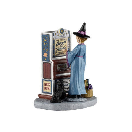 Lemax Spooky Town Spell O'Matic figurine featuring a whimsical haunted spell book with glowing magical symbols and intricate details.