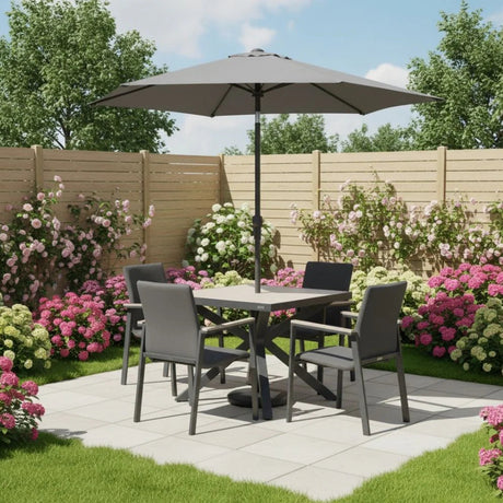 Kettler Tudor 4-seat metal dining set with matching parasol and base, featuring a stylish outdoor furniture design.