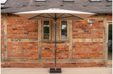 Wall-mounted Kettler rectangular balcony parasol with auto tilt and night cover, featuring wind-up mechanism for adjustable shading.
